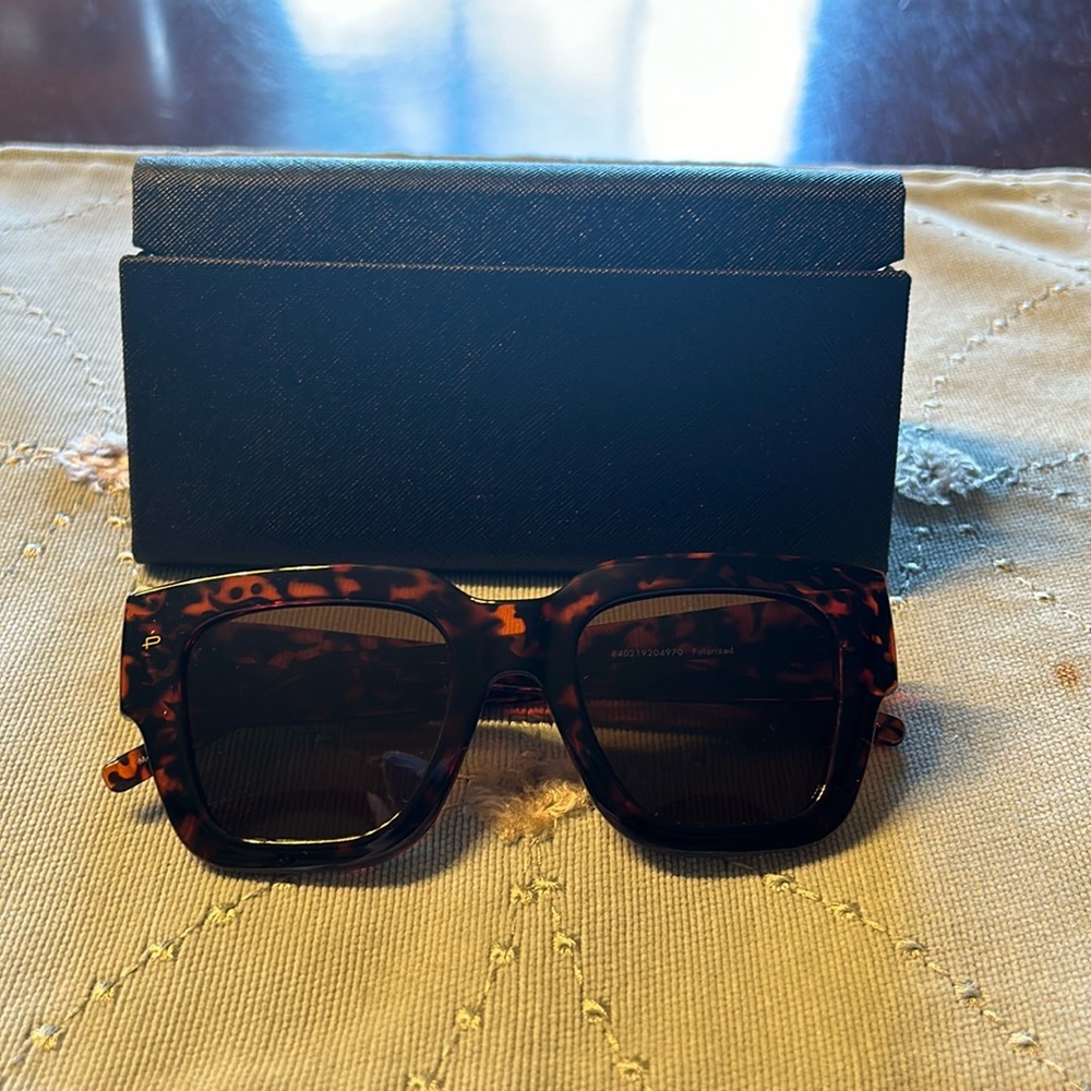 Sunglasses.  Case included